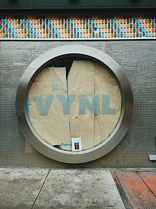book on round silver framed glass window thumbnail