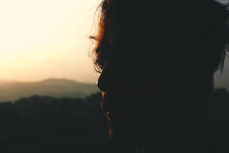 Silhouette of Man during Sunset thumbnail