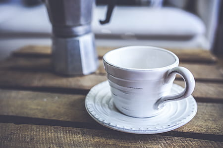 white ceramic teacup on saucer thumbnail