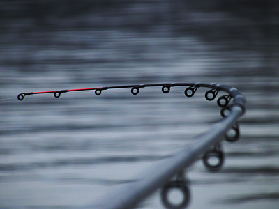 black and red fishing rod thumbnail
