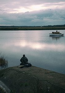 Fisher and boat thumbnail