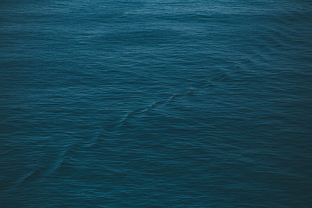 calm body of water photo thumbnail