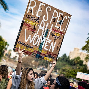 woman raising respect all women signage outdoor thumbnail