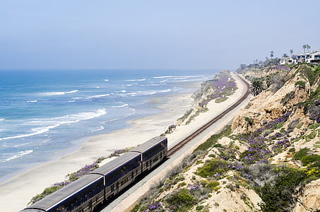 train near seashore thumbnail