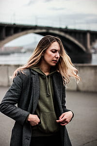 woman putting her hands on pocket thumbnail