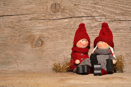 two girl dolls beside brown wooden wall thumbnail