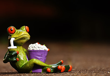 green and red ceramic frog figurine thumbnail
