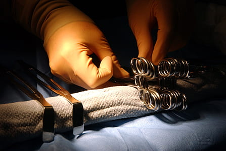 close-up photo of surgeon doing operation thumbnail