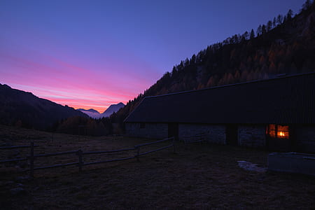 silhouette of mountain during golden hour thumbnail