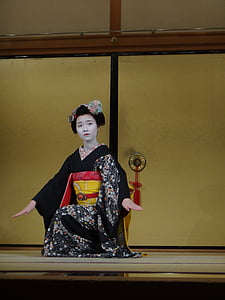 woman wearing black and white kimono thumbnail