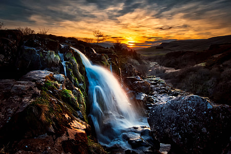high rise mountain and water falls thumbnail