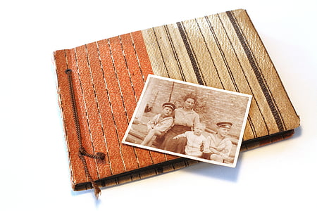 woman with three boys photo on photo album thumbnail
