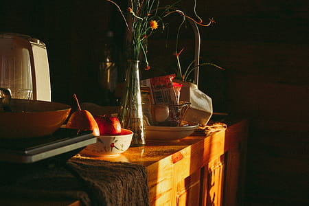 Wooden Table With Clear Glass Vase thumbnail