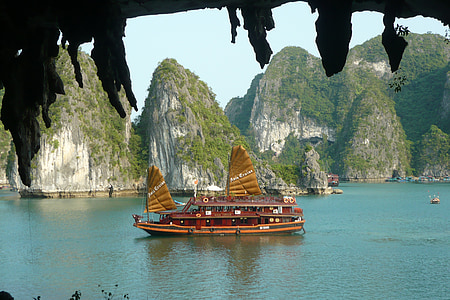 brown wooden boat on body of water thumbnail