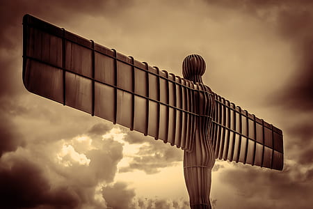 human with wing statue thumbnail