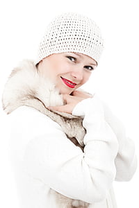 woman wearing white knitted beanie and fur jacket thumbnail