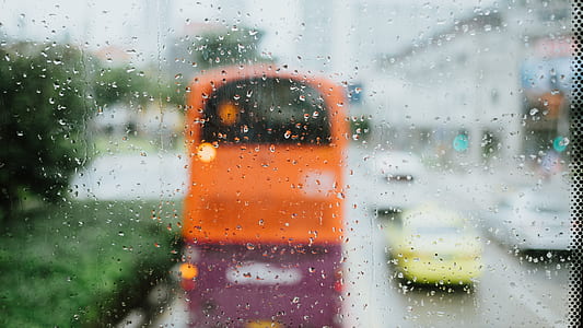 blurry photo of orange bus thumbnail