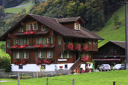 brown and white 4-storey house thumbnail