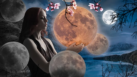 woman holding moon with body of water in background wallpaper thumbnail
