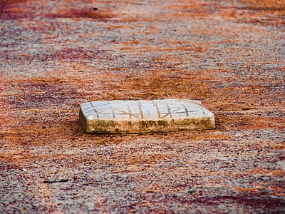 rectangular brown rock on brown ground thumbnail