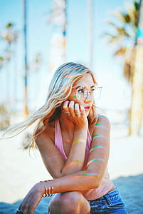 woman kneeling on ground thumbnail