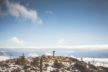 Man With Open Arms on The Top of The Mountain thumbnail