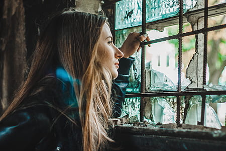 photo of woman holding window grill thumbnail