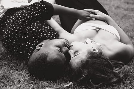 grayscale photo of coupe lying down thumbnail