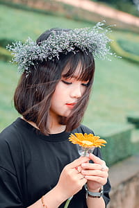 Woman Holding Flower thumbnail