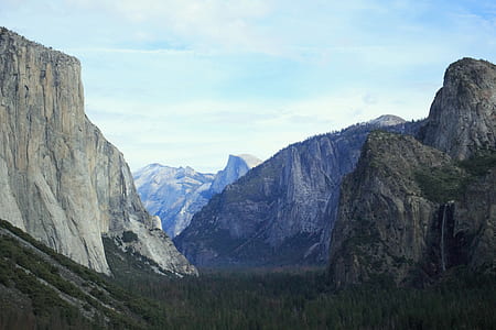 landscape photography of a mountain with trees thumbnail