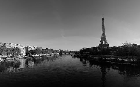 grayscale photography of large river near Eiffel Tower thumbnail