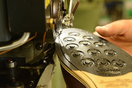 person holding shoe thumbnail