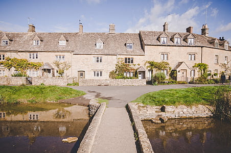 panoramic photography of beige houses thumbnail