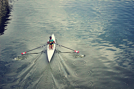 man rowing white kayak thumbnail