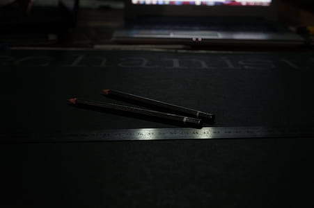 Black Pencil Near Grey Steel Ruler thumbnail