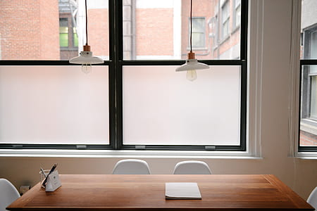 two turned-off white pendant lamps thumbnail