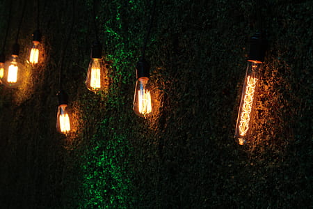 low light photography of wall-mount outdoor lanterns thumbnail