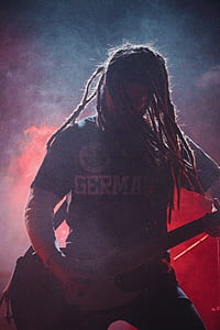 man playing electric guitar thumbnail
