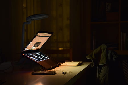 black laptop computer on white table thumbnail