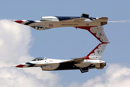 white and black air crafts doing tricks thumbnail
