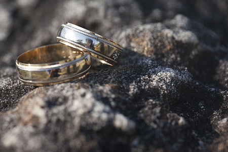 two silver-colored band rings thumbnail