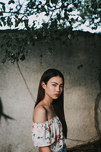 woman wearing white floral off-shoulder top thumbnail