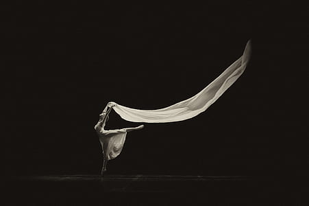 ballerina holding white textile thumbnail