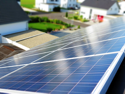 blue solar panel on top of house thumbnail