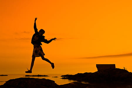 silhouette of person near body of water thumbnail
