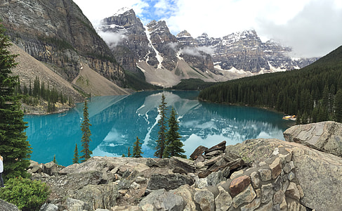 gray rock mountain near body of water thumbnail