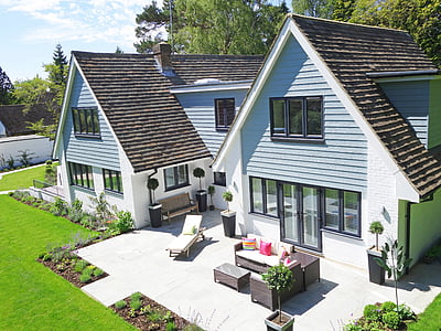 two white gray storey house thumbnail