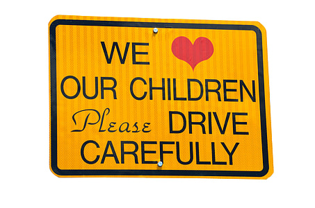 we love our children please drive carefully road singage thumbnail