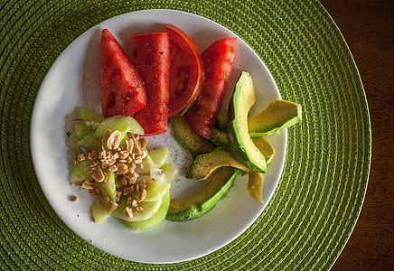 sliced avocado and watermelon on white ceramic plate thumbnail