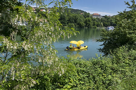person riding yellow boat thumbnail
